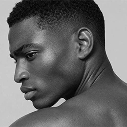Black and white profile portrait of man showing hairline and facial features for PRP hair treatment consultation - Male rhinoplasty in Montreal, QC